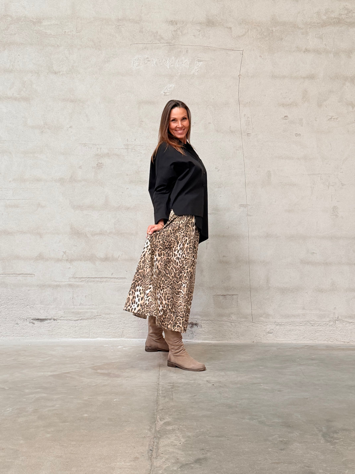 Kamilla er 174 cm høj og bruger størrelse M/L