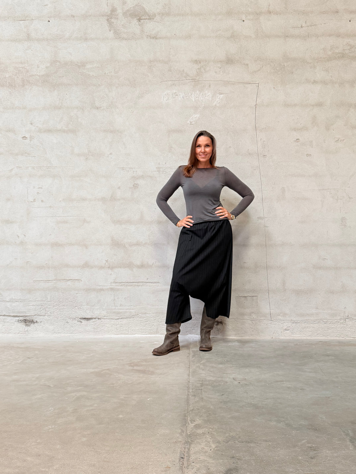 Kamilla er 174 cm høj og bruger størrelse M/L