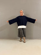 Helle er 168 cm høj og bruger størrelse S/M
