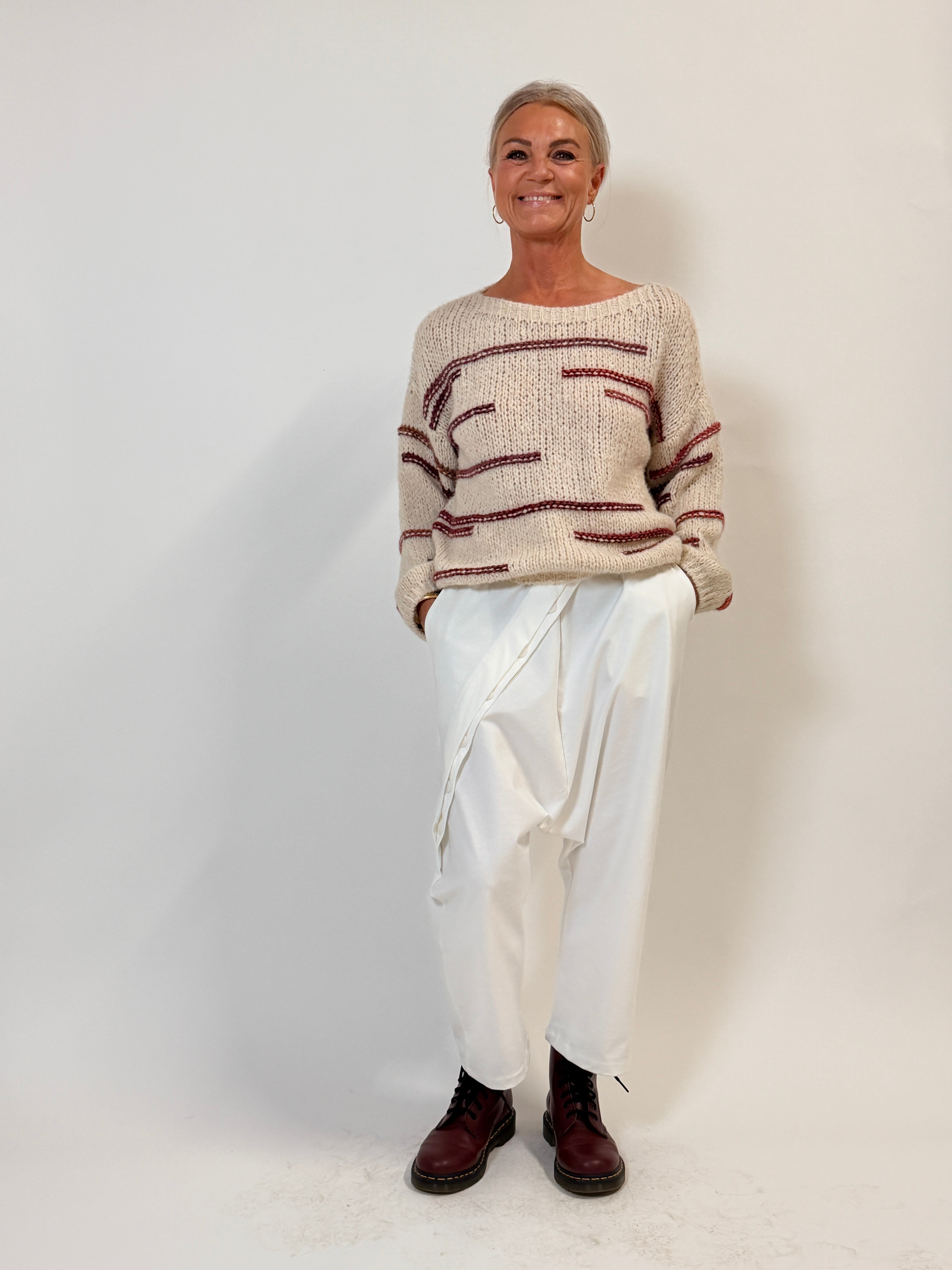 Helle er 168 cm høj og bruger størrelse S/M