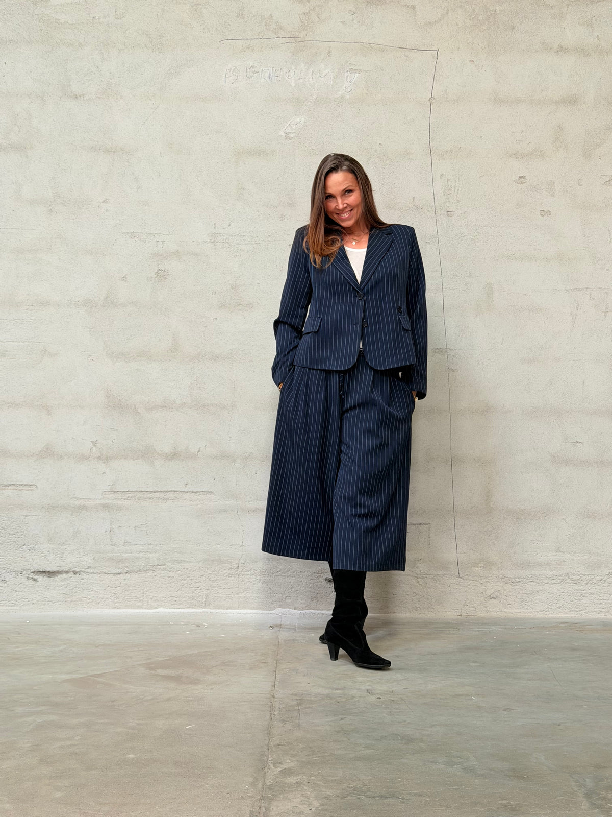 Kamilla er 174 cm høj og bruger størrelse M/L