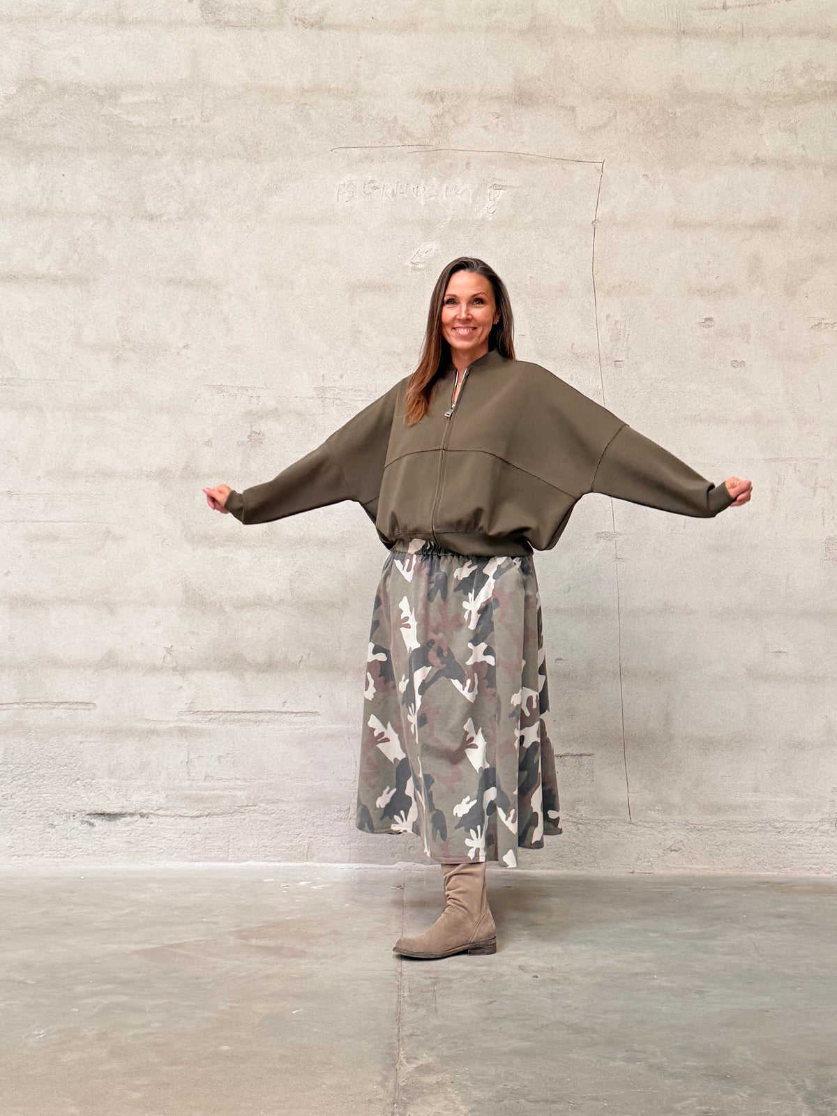 Kamilla er 174 cm høj og bruger størrelse M/L