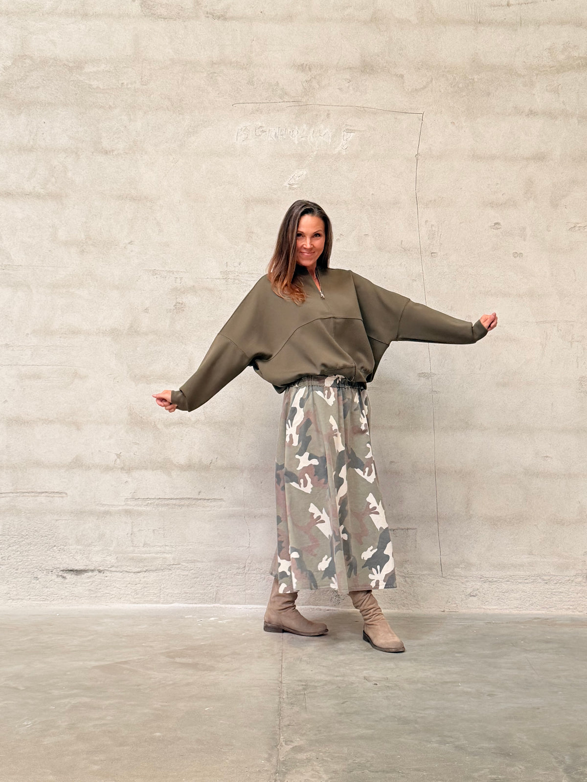 Kamilla er 174 cm høj og bruger størrelse M/L