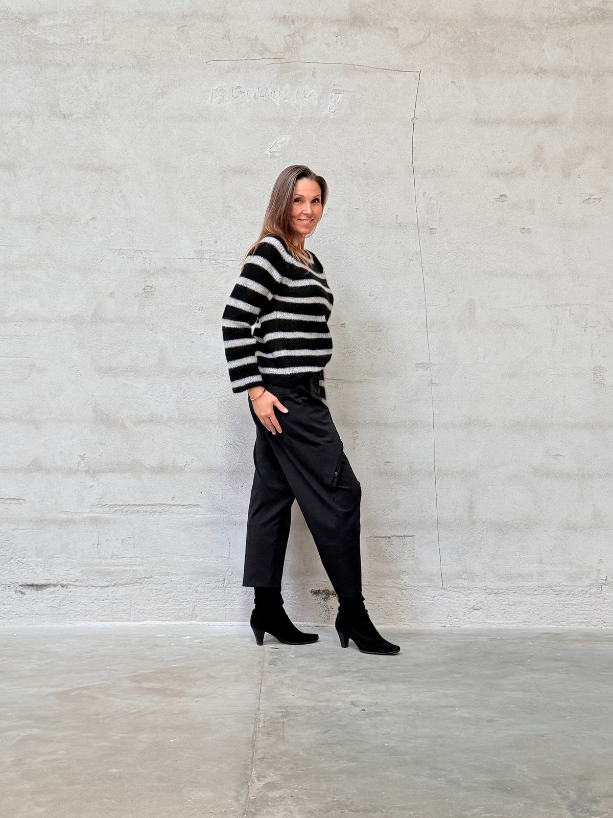 Kamilla er 174 cm høj og bruger størrelse M/L