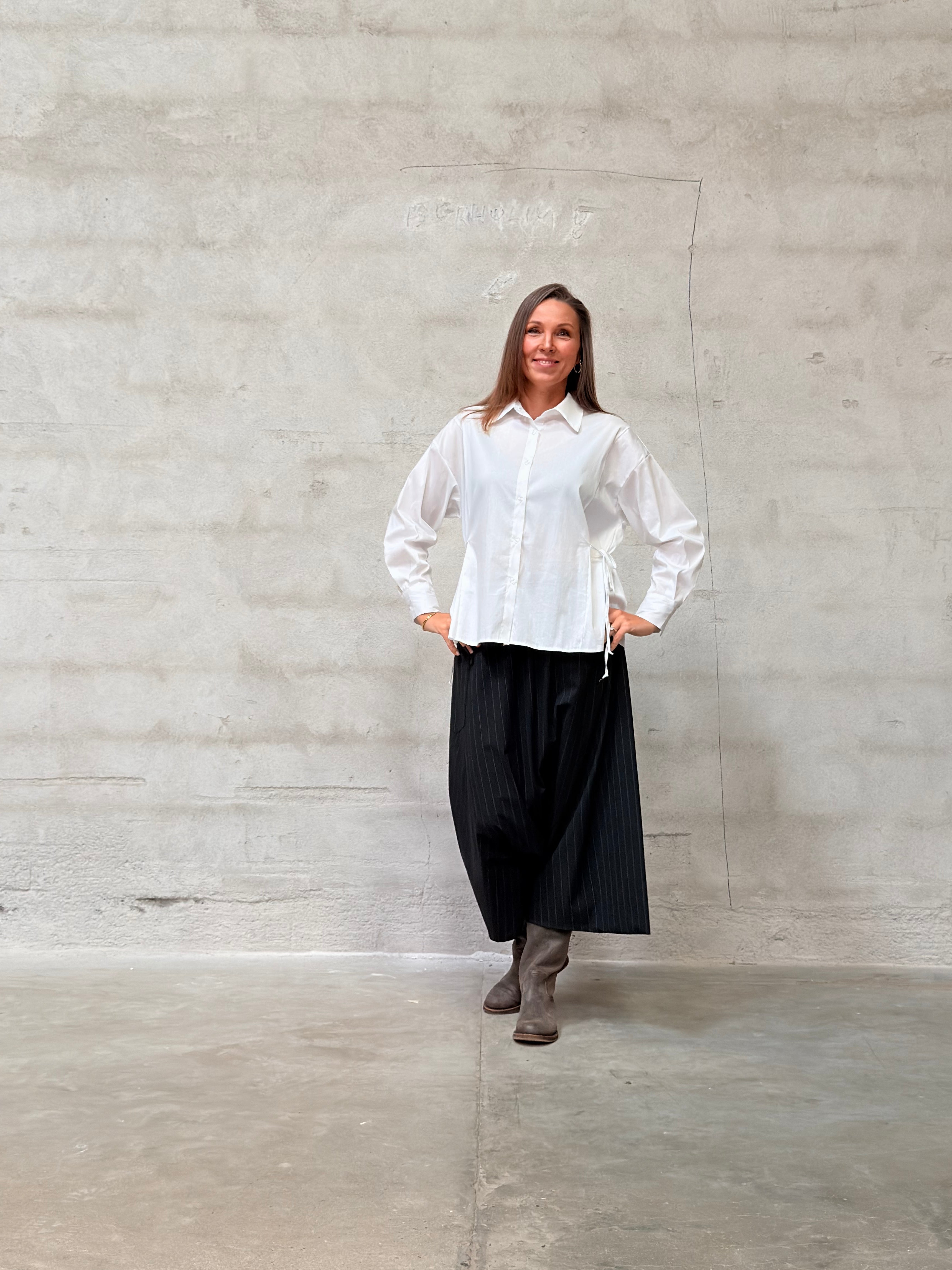 Kamilla er 174 cm høj og bruger størrelse M/L