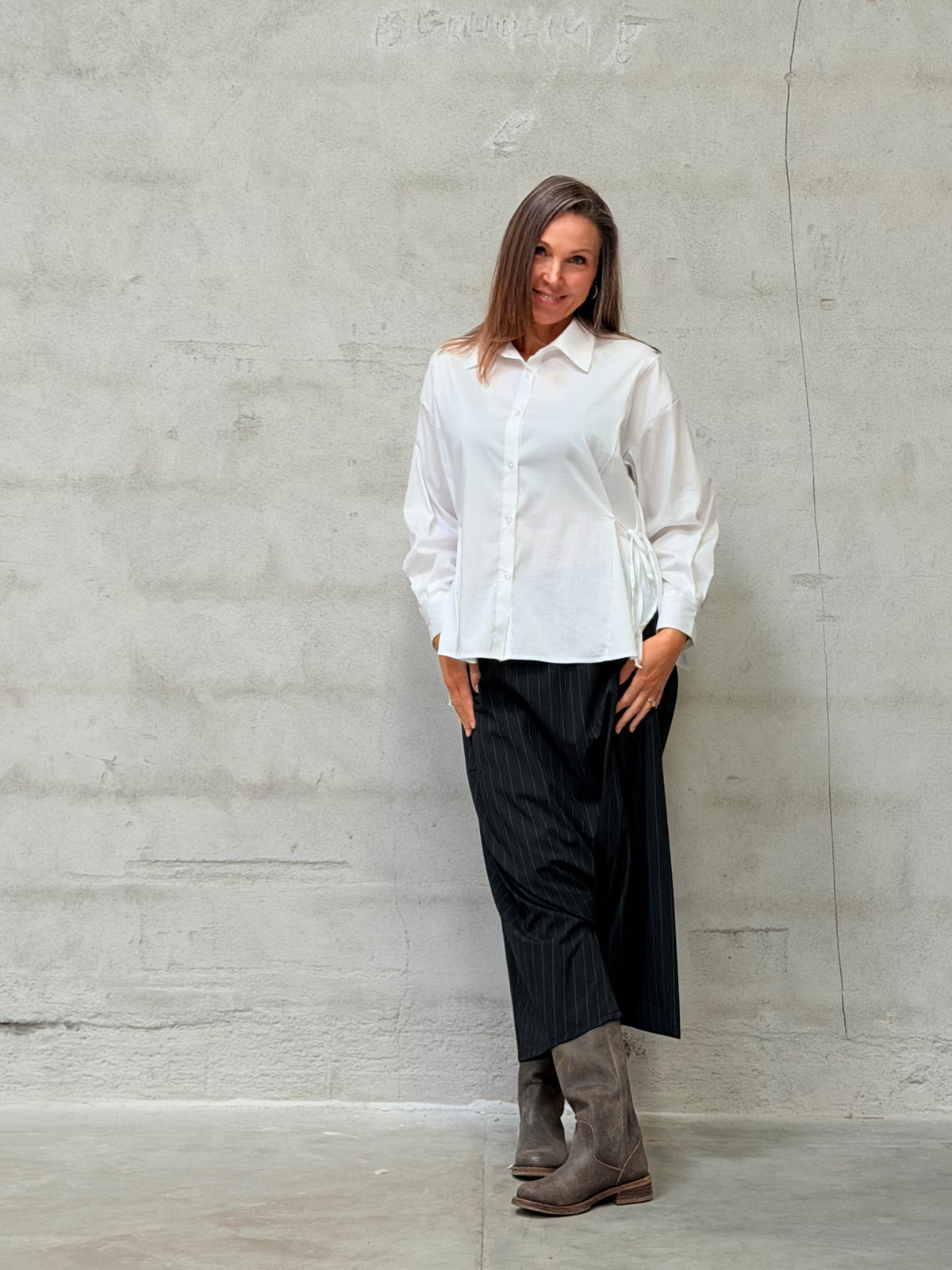 Kamilla er 174 cm høj og bruger størrelse M/L