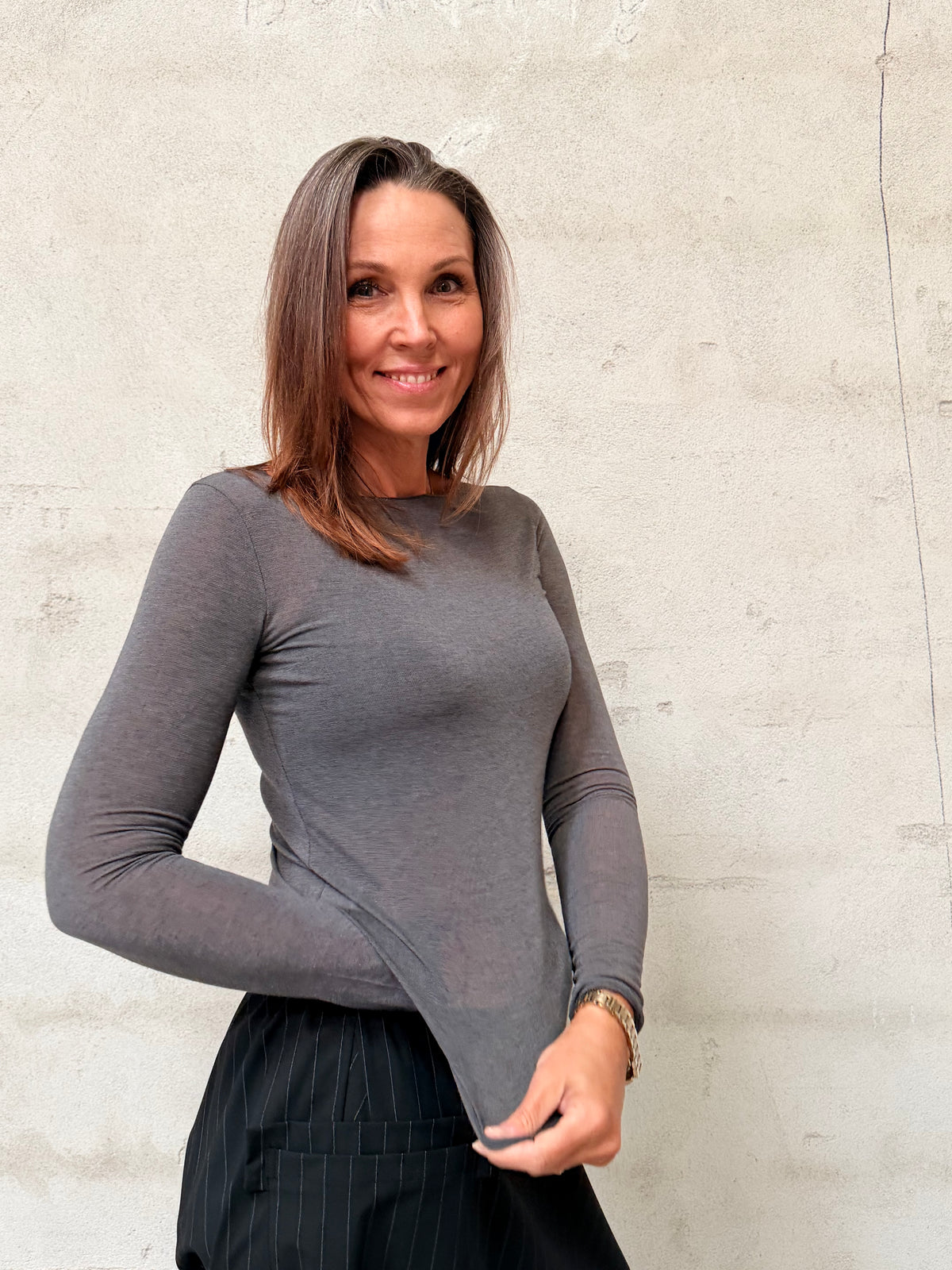 Kamilla er 174 cm høj og bruger størrelse M/L