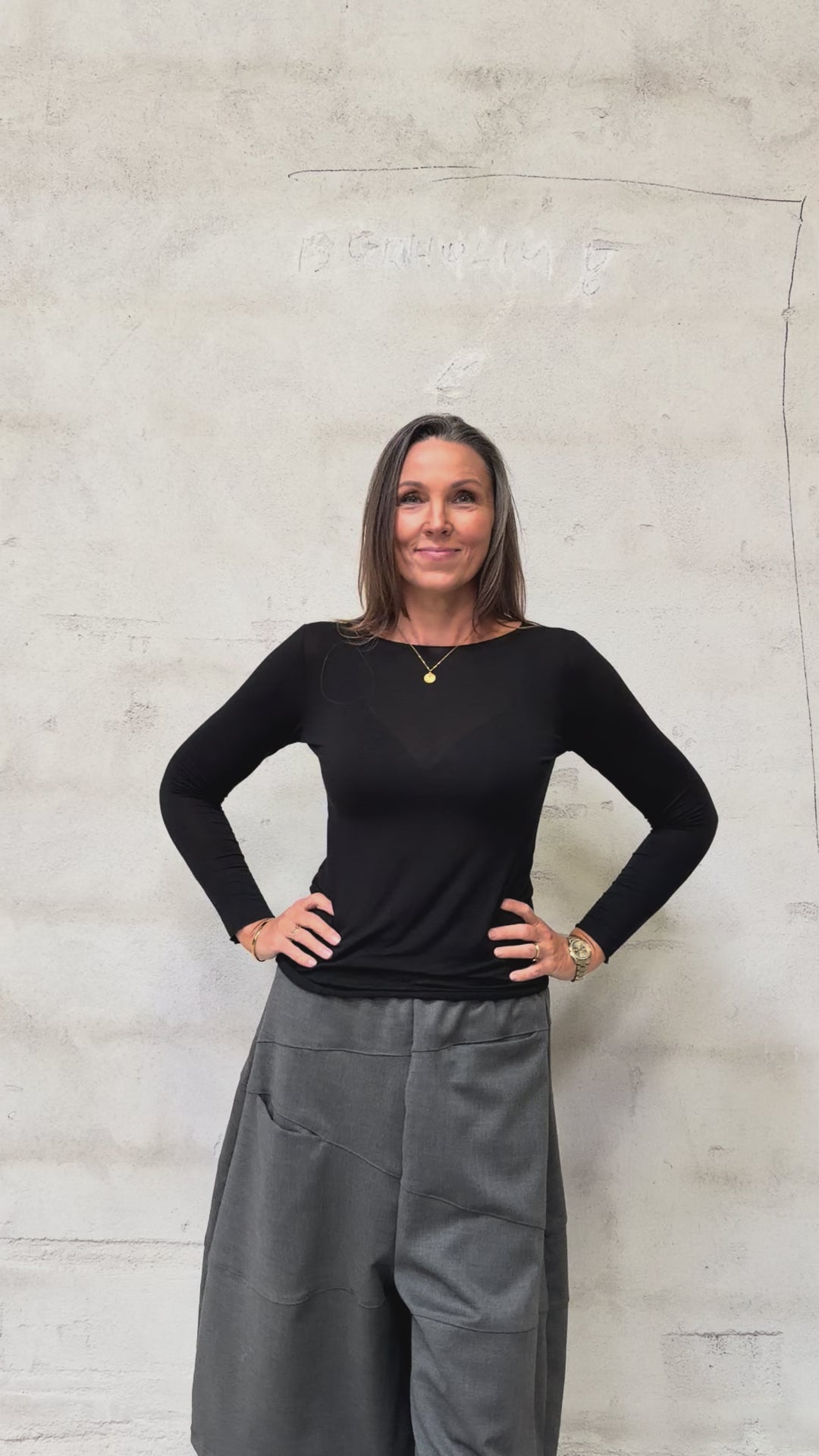 Kamilla er 174 cm høj og bruger størrelse M/L